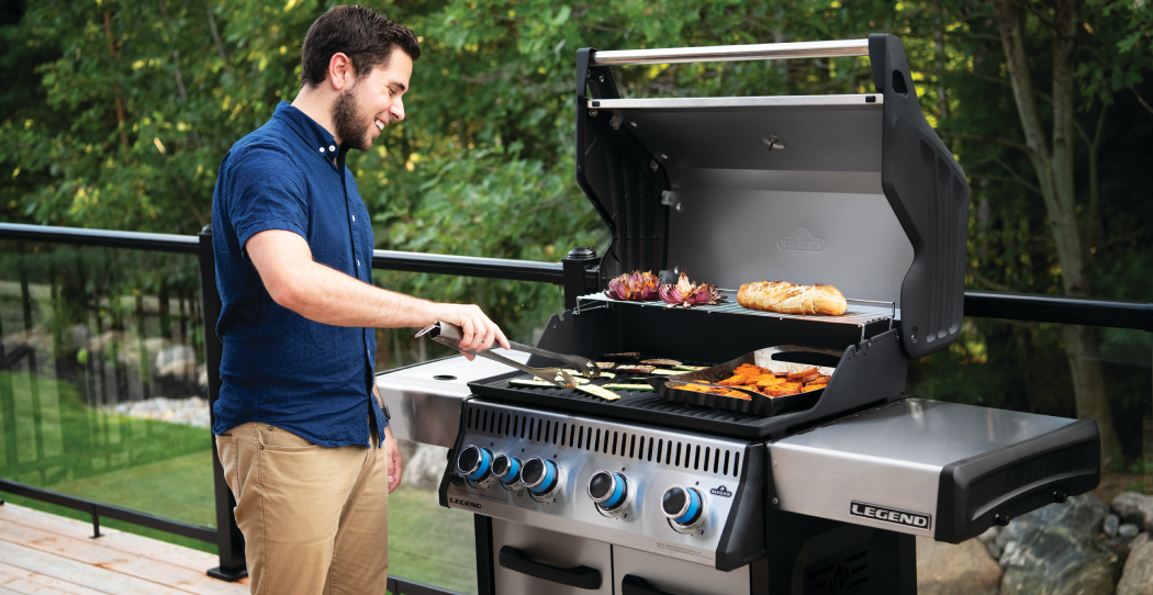 man grilling outside